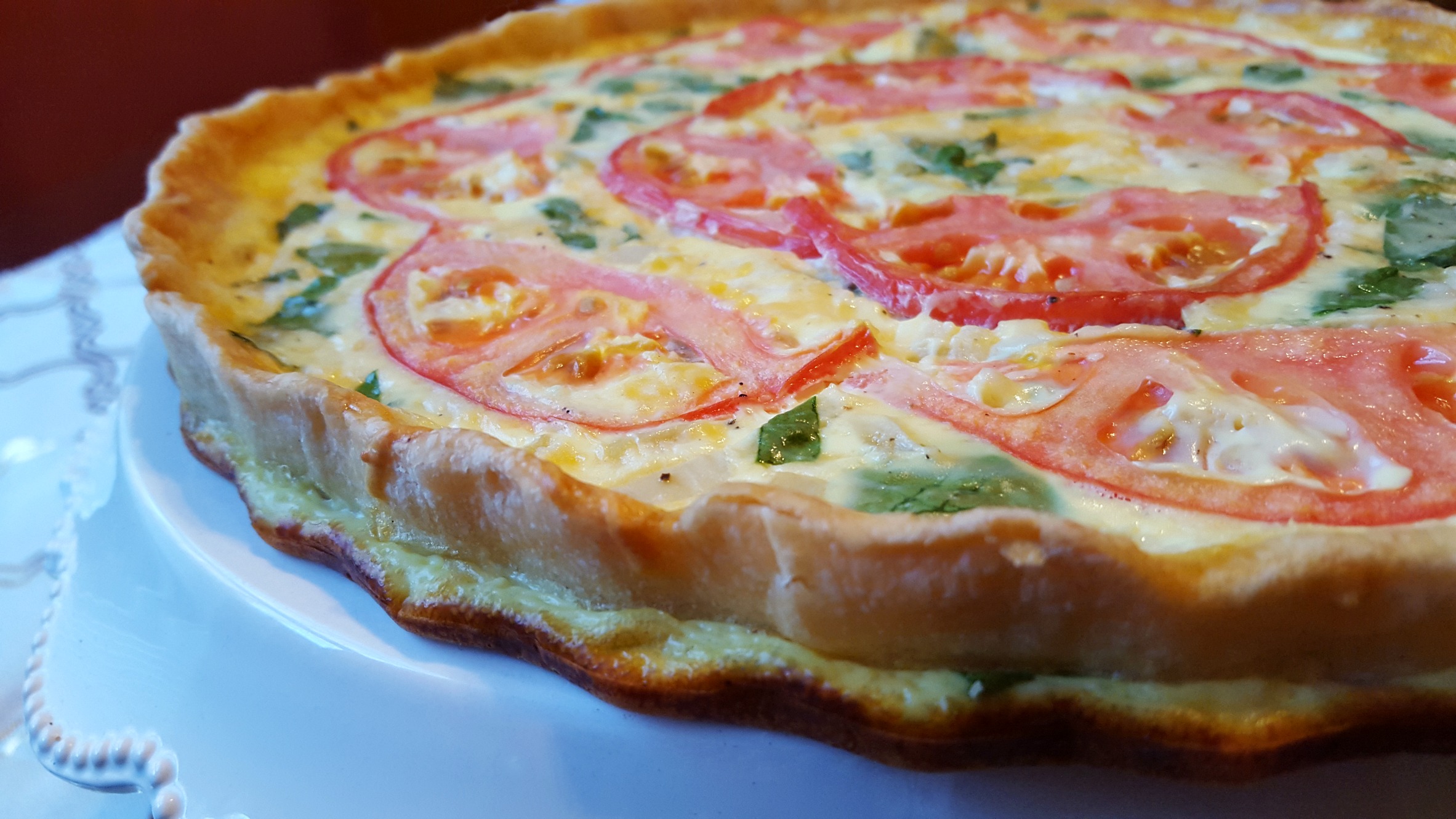Tomato and Spinach Quiche | Original Recipe from Anyssa Alonso on @ShesIntentional